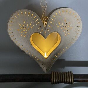 Beautiful metal primitive hanging tea light holder 14x14 cream color.